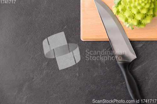 Image of romanesco broccoli and knife on cutting board