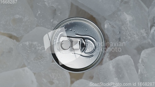 Image of Aluminum Soda Tin Can Rotating in cool Ice motion footage