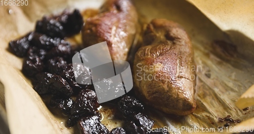 Image of Roast duck breast with plums prepared motion footage