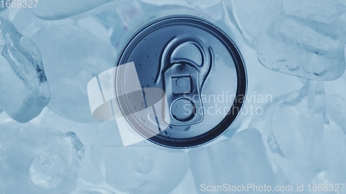 Image of Aluminum Soda Tin Can Rotating in cool Ice motion footage