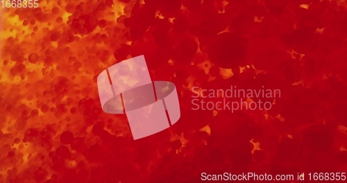 Image of Stream of red blood cells in glowing plasma closeup footage