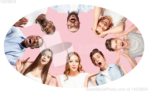Image of Collage of close up portraits of young people on pink background.