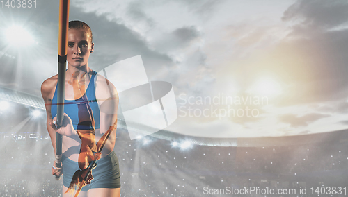 Image of Female pole vaulter training or performing at the stadium