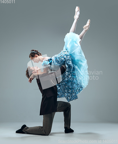 Image of Contemporary ballroom dancers on grey studio background