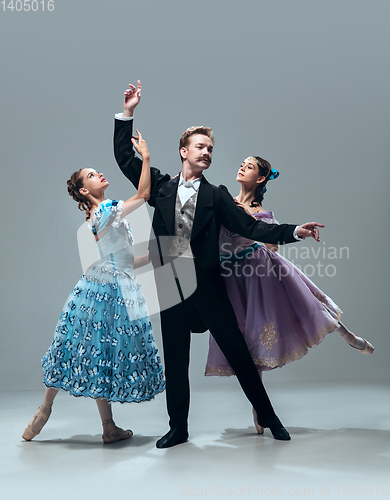 Image of Contemporary ballroom dancers on grey studio background