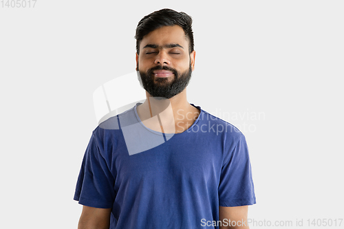 Image of Portrait of young man isolated on white studio background