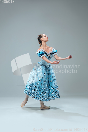 Image of Contemporary ballroom dancer on grey studio background