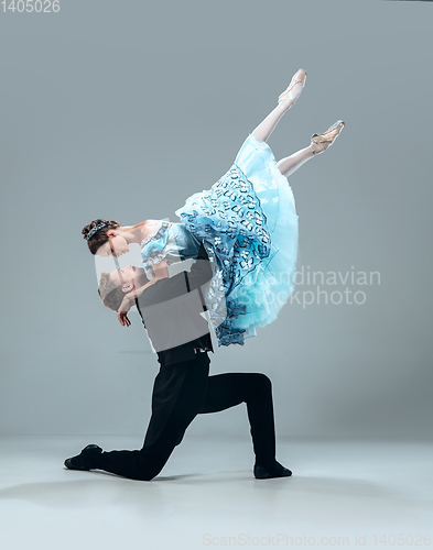 Image of Contemporary ballroom dancers on grey studio background