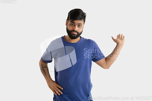 Image of Portrait of young man isolated on white studio background