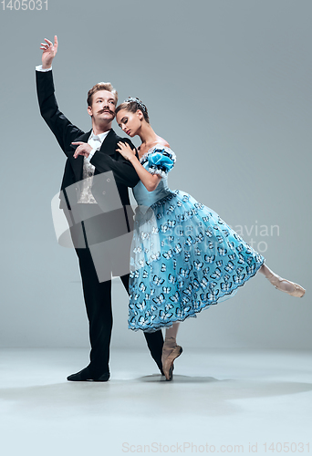 Image of Contemporary ballroom dancers on grey studio background