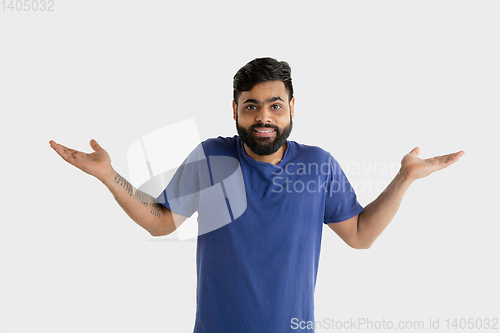 Image of Portrait of young man isolated on white studio background