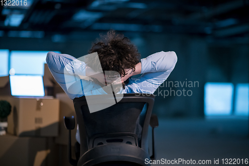 Image of young business man taking a break on construction site