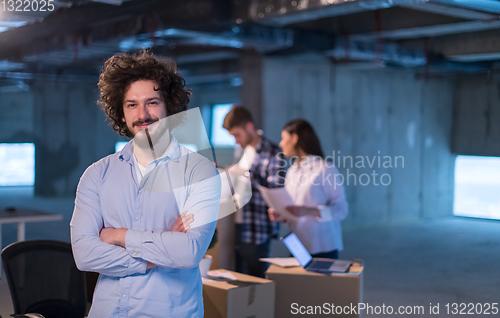 Image of young businessman on construction site