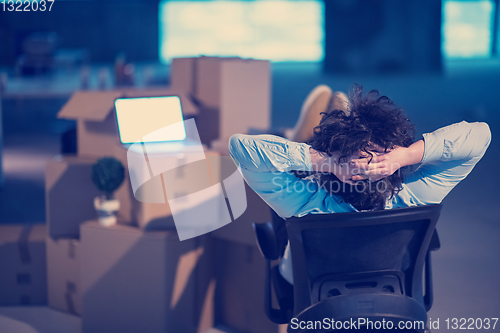 Image of young business man taking a break on construction site