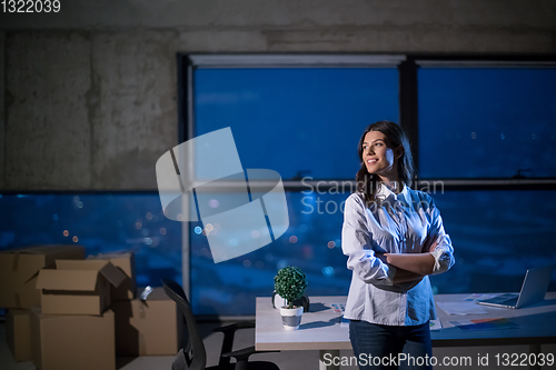 Image of young female architect and engineer on construction site