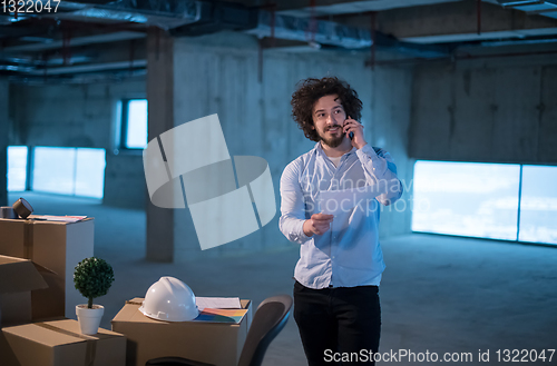 Image of man architect on construction site