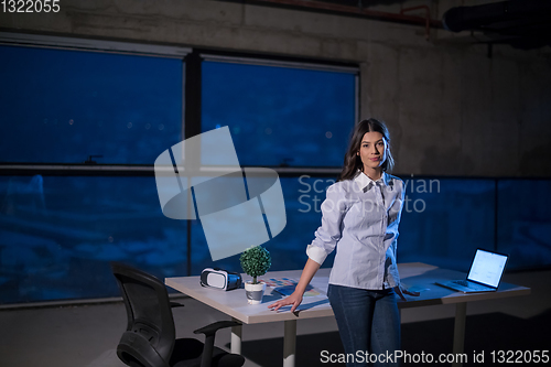 Image of young female architect and engineer on construction site