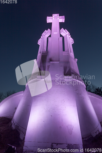Image of Purple Illuminated Monument of Three Crosses in Vilnius