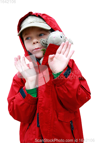 Image of Boy with toy lambkin