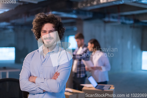 Image of young businessman on construction site