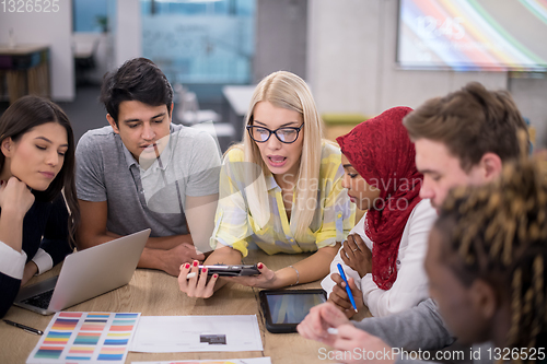 Image of Multiethnic startup business team having meeting