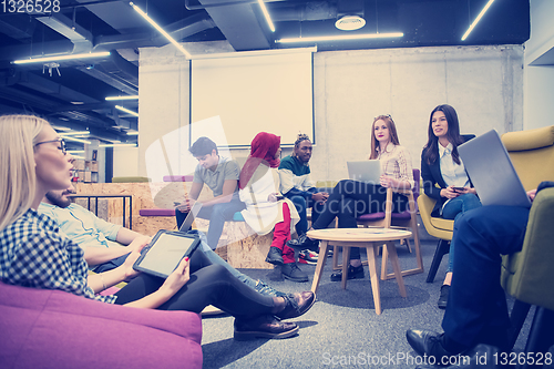 Image of Multiethnic startup business team having meeting