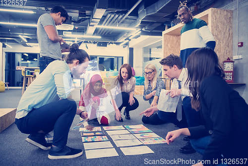 Image of black muslim woman having meeting with Multiethnic  startup busi