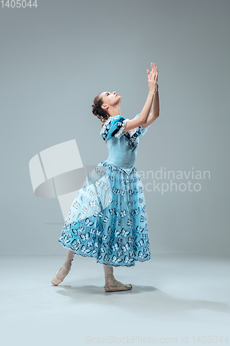 Image of Contemporary ballroom dancer on grey studio background