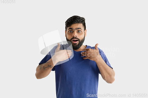 Image of Portrait of young man isolated on white studio background