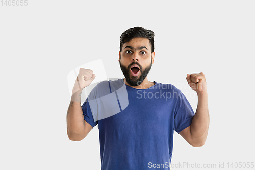 Image of Portrait of young man isolated on white studio background