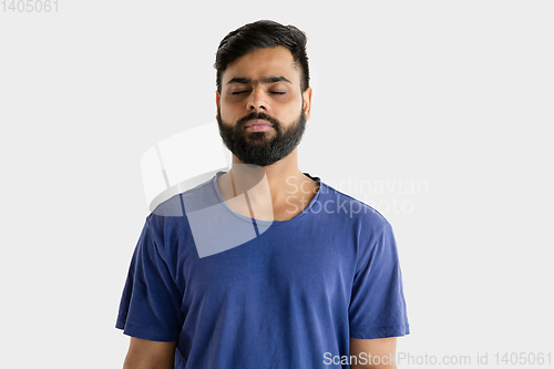 Image of Portrait of young man isolated on white studio background