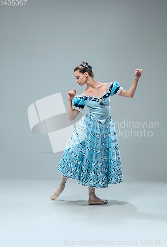 Image of Contemporary ballroom dancer on grey studio background