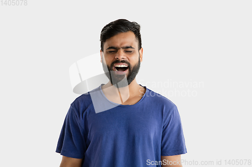 Image of Portrait of young man isolated on white studio background