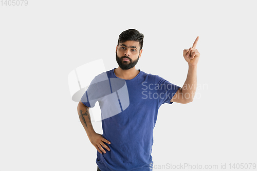 Image of Portrait of young man isolated on white studio background