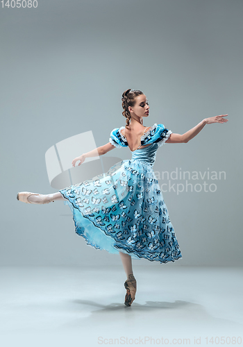 Image of Contemporary ballroom dancer on grey studio background