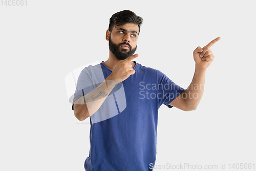 Image of Portrait of young man isolated on white studio background