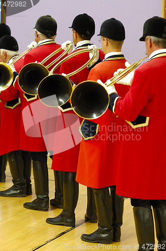 Image of musicians playing on hunting horns