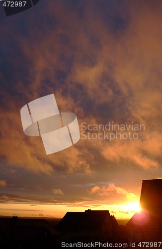 Image of stratus clouds with orange reflection on sunset