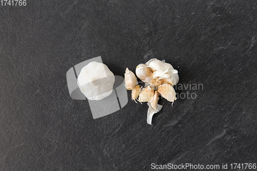 Image of garlic on slate stone background