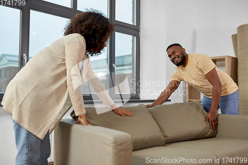 Image of happy couple moving to new home