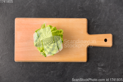 Image of romanesco broccoli on wooden cutting board