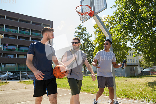 Image of group of male friends going to play basketball