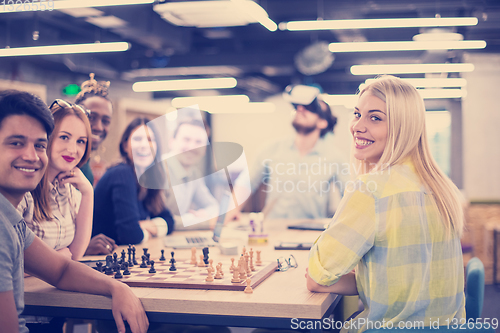 Image of Young Multiethnic Business team using virtual reality headset