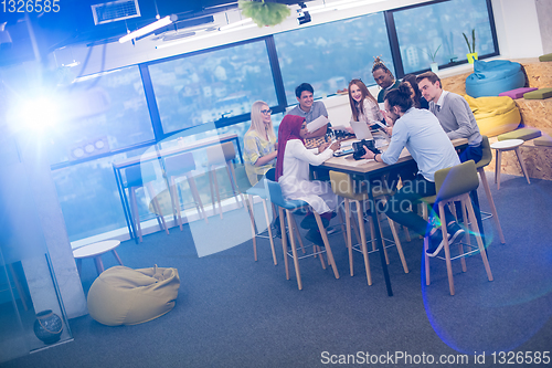 Image of Young Multiethnic Business team using virtual reality headset