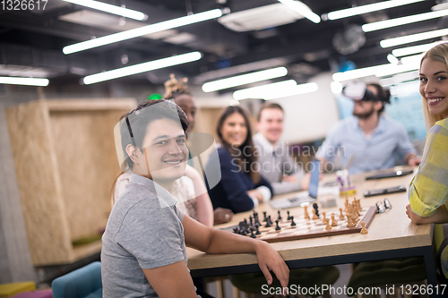 Image of Young Multiethnic Business team using virtual reality headset