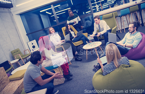 Image of Multiethnic startup business team having meeting