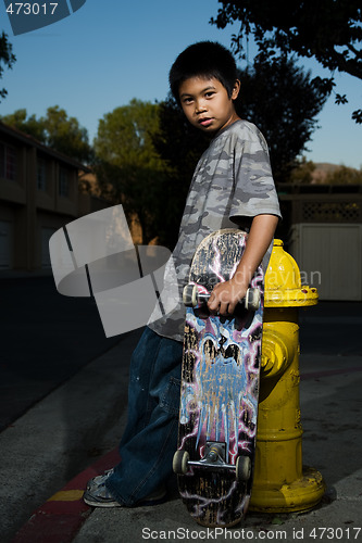 Image of Young skate boarder