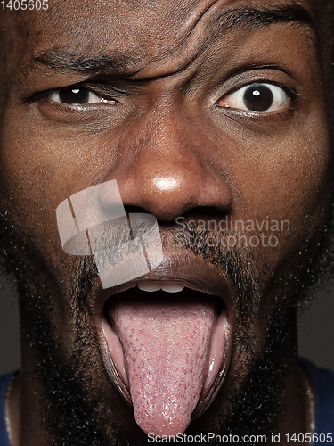 Image of Close up portrait of young african-american man