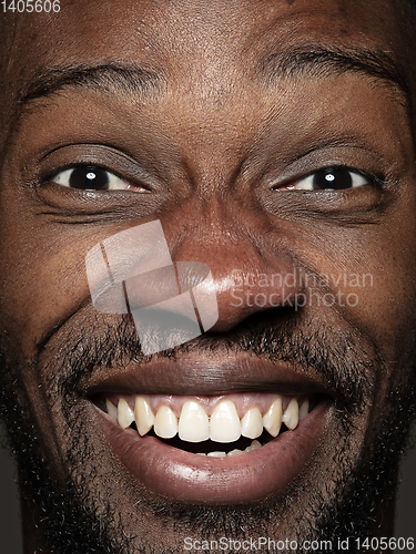 Image of Close up portrait of young african-american man