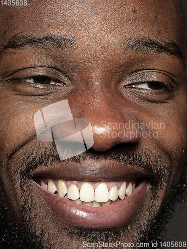 Image of Close up portrait of young african-american man